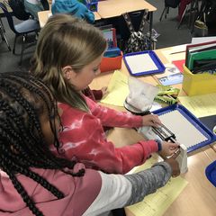 Students building a project. 