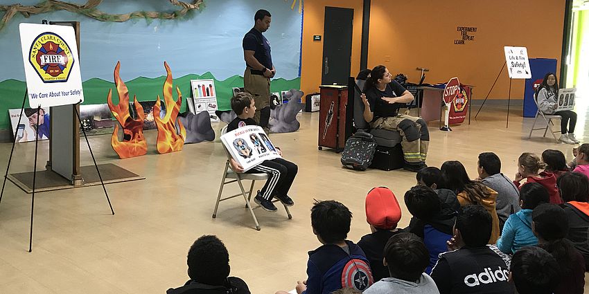 Students watching a Fire safety assembly