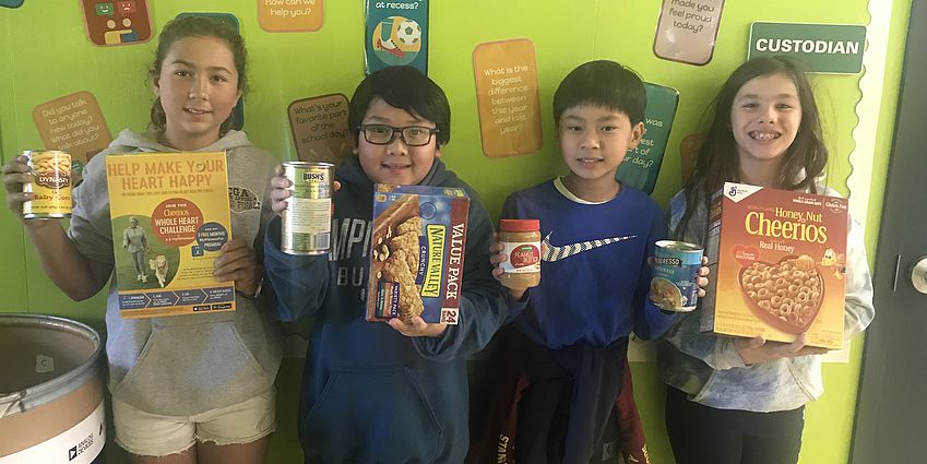 Students holding food