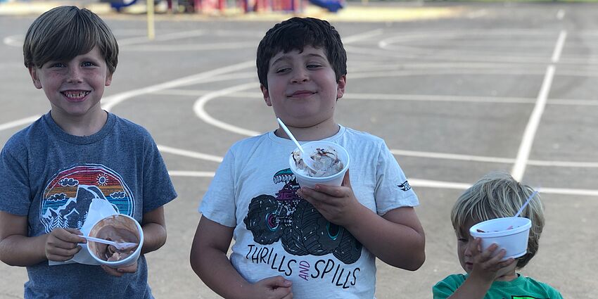 3 boys eating ice cream