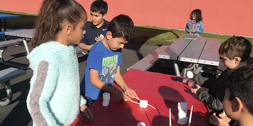 Students playing a game outside