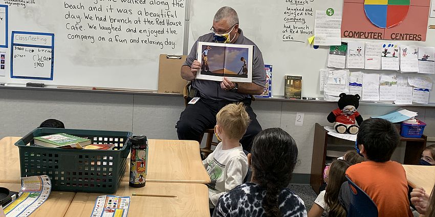 Mr. Brown reading to 2nd grade