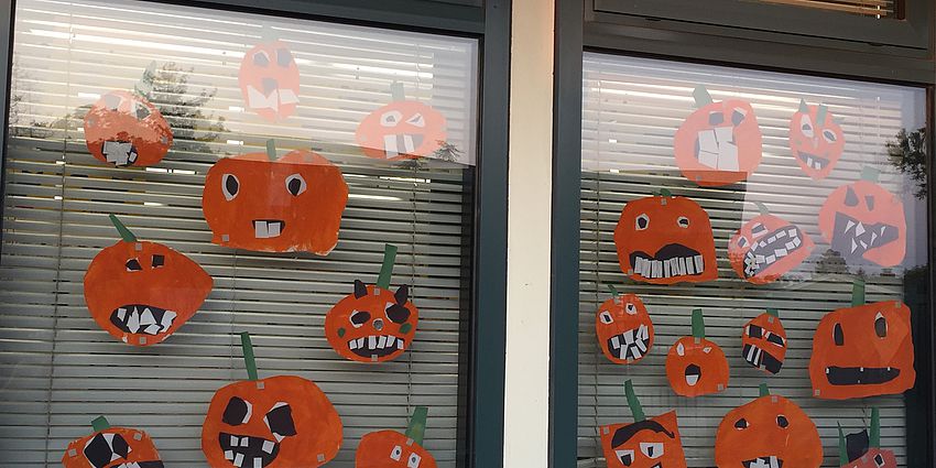 Window with pumpkins on it