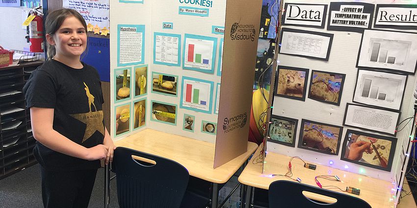Student with her science project