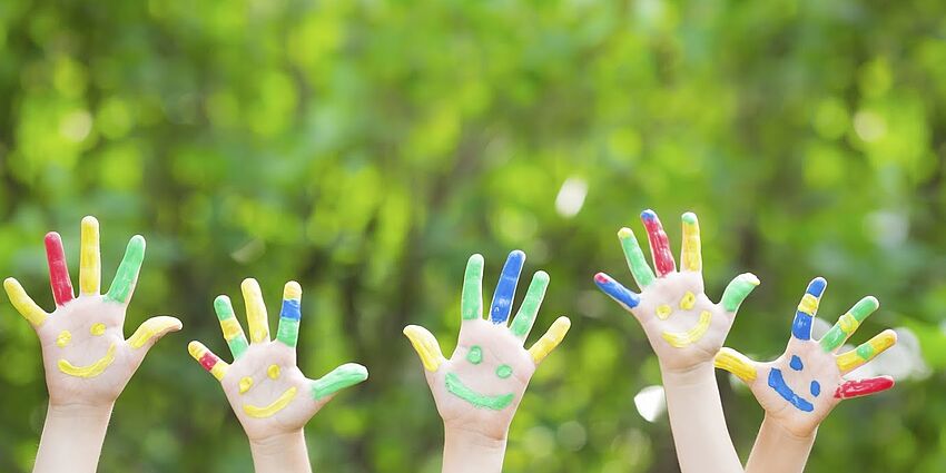 Children's hands in the air