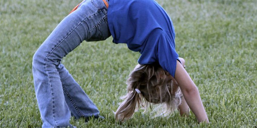 Child doing backbend