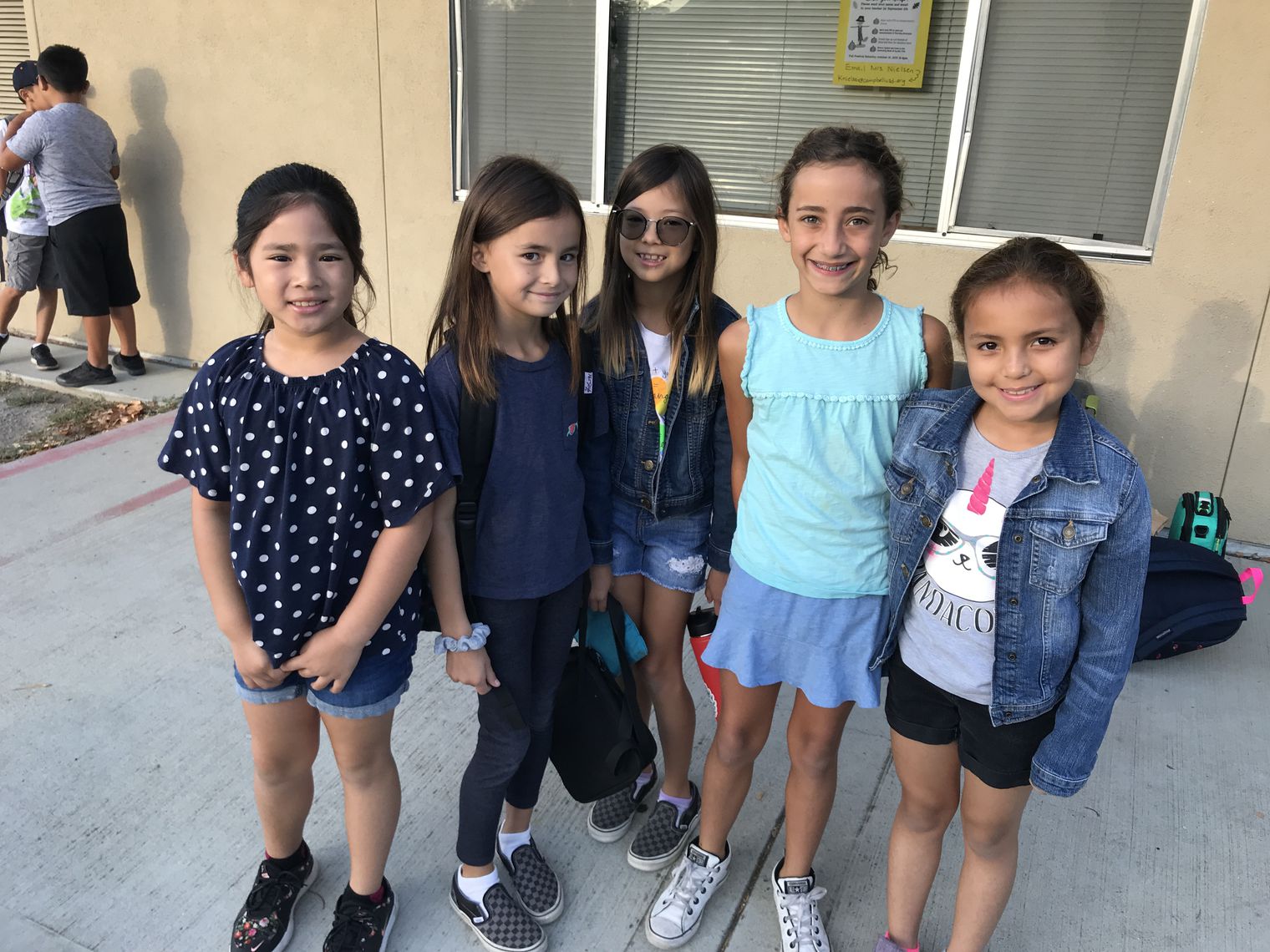 5 students smiling