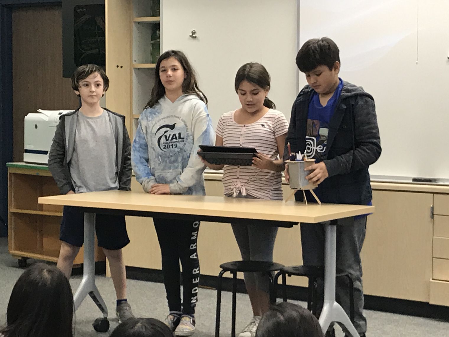4 students presenting.