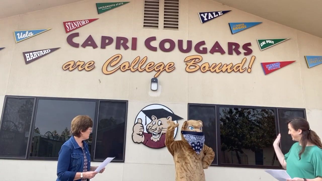 Mrs. Wellendorf and Mrs. Eshoff and Cooper the Cougar