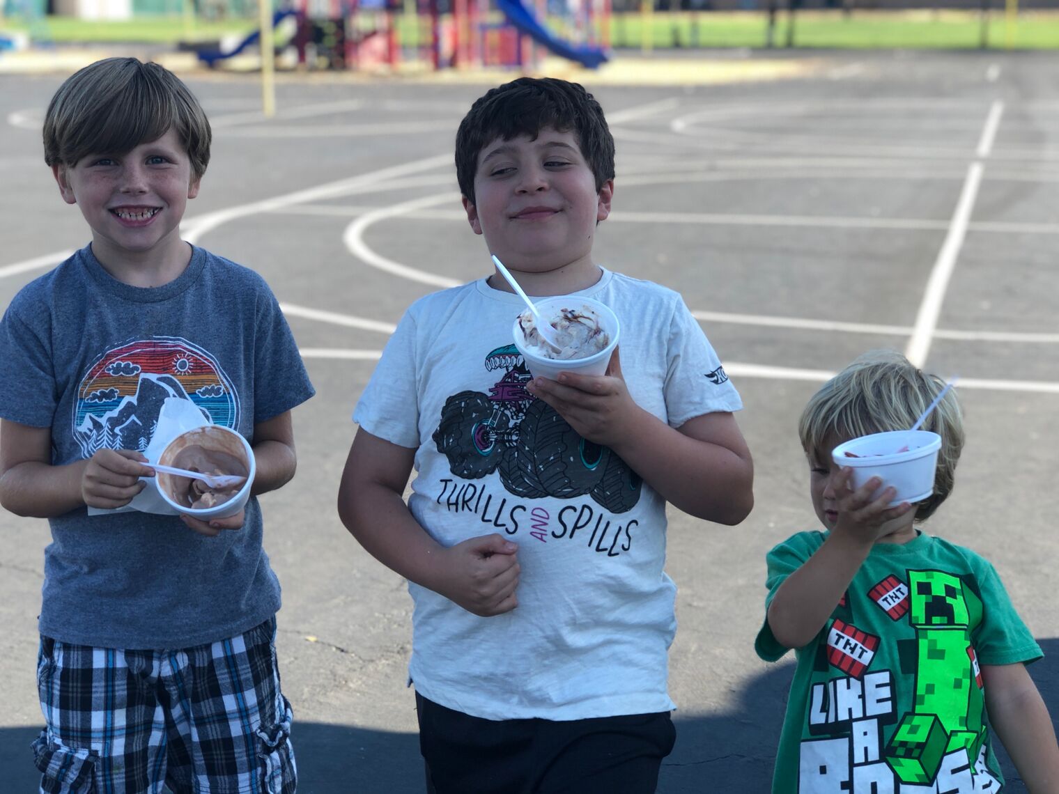 3 boys eating ice cream
