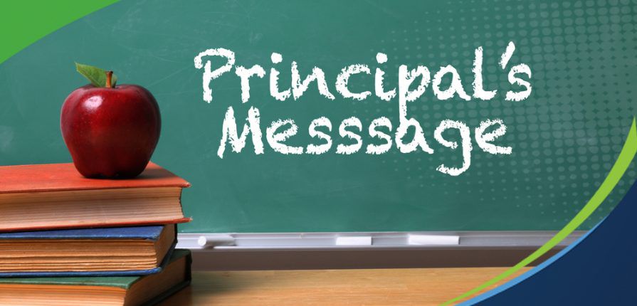 Chalkboard with Principal's Message written on it.