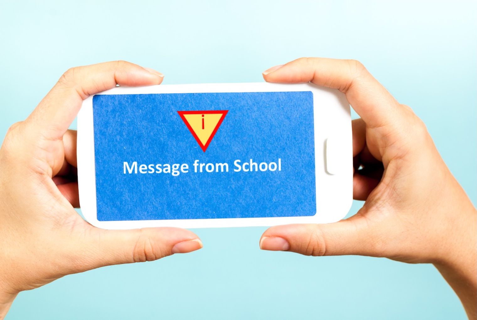 Phone with a message from school on it.