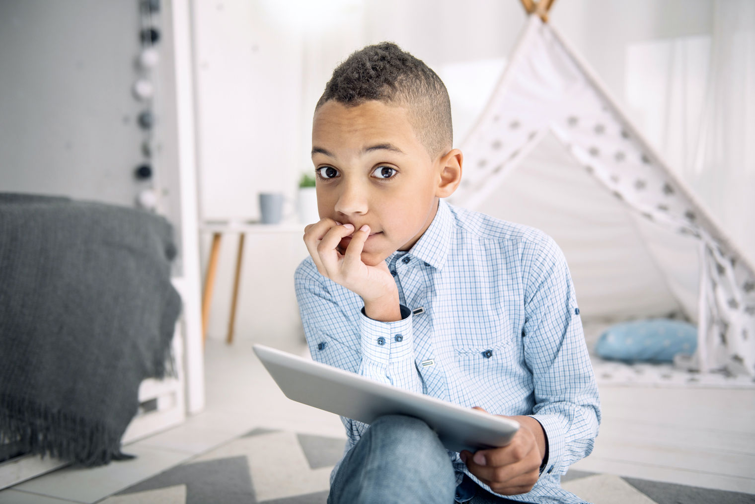 Young boy with iPad.