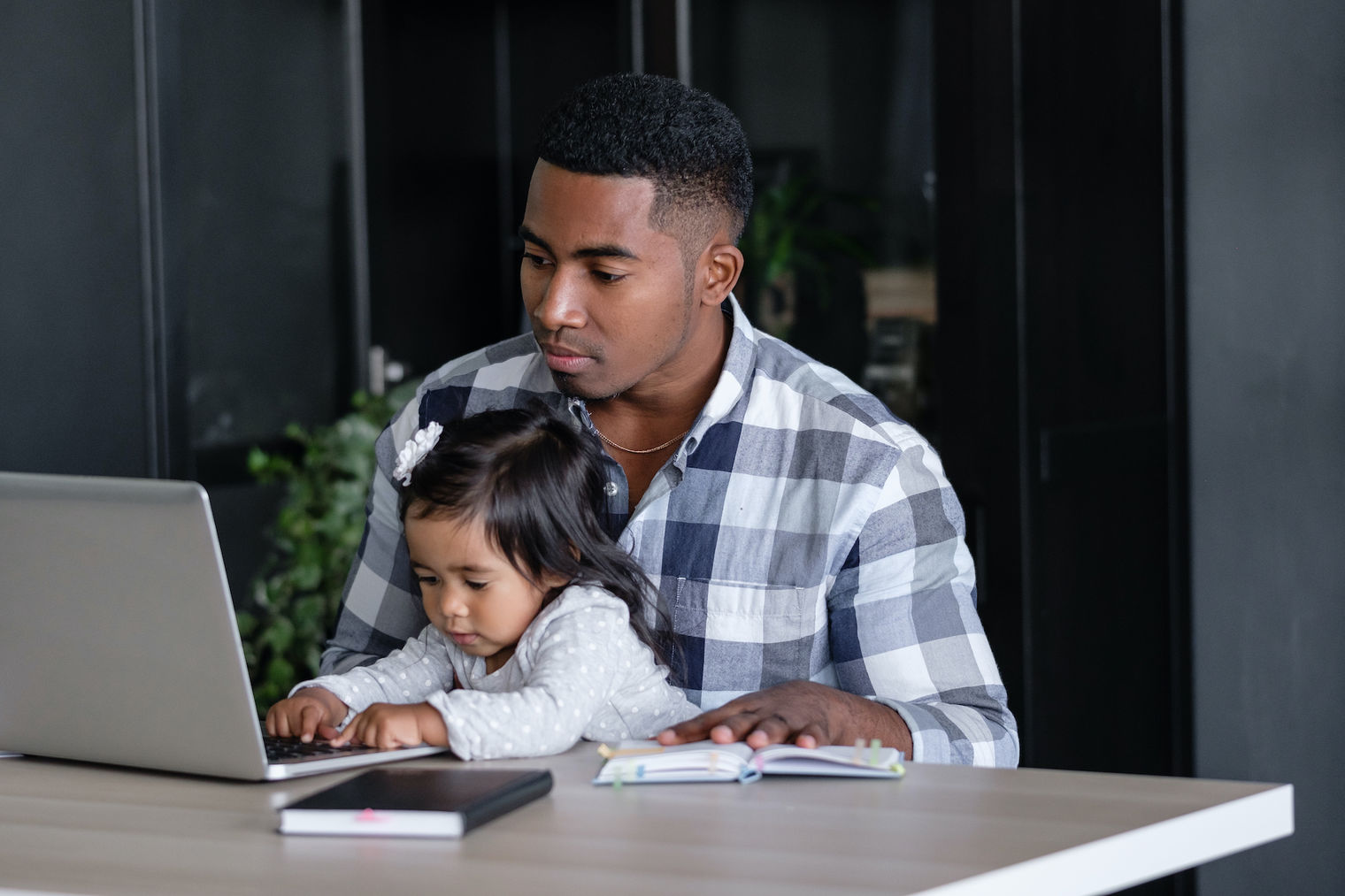 Father and daughter on a computer