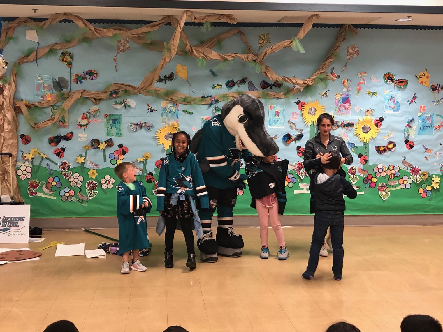 SJ Sharkie with students laughing