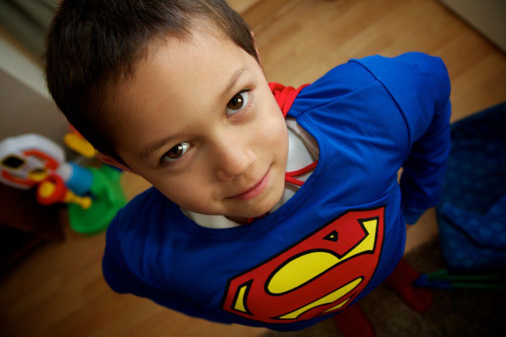 Child dressed up like superman
