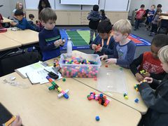 Students playing legos