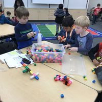 Students playing legos