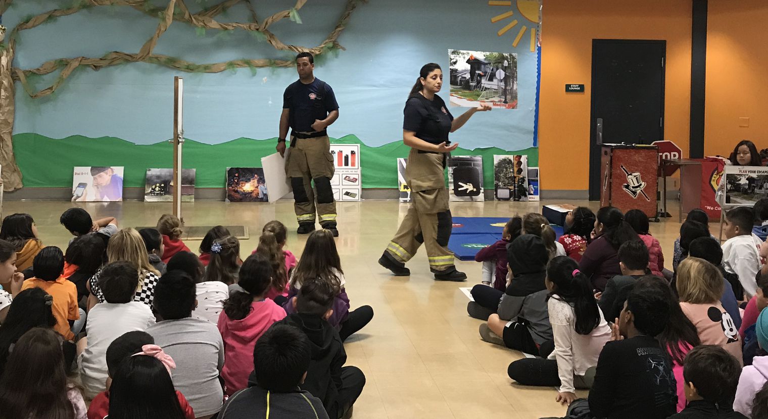 Firefighters putting on an assembly