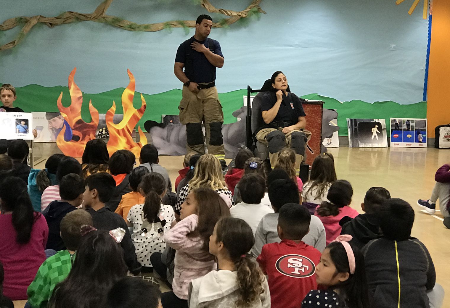 Firefighters putting on an assembly