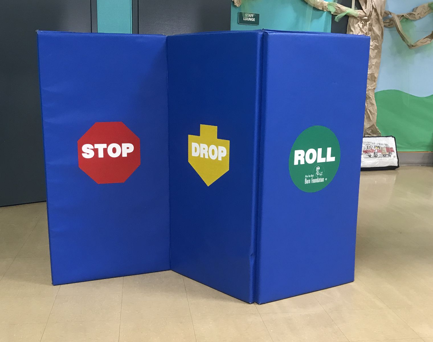 Stop drop and roll sign