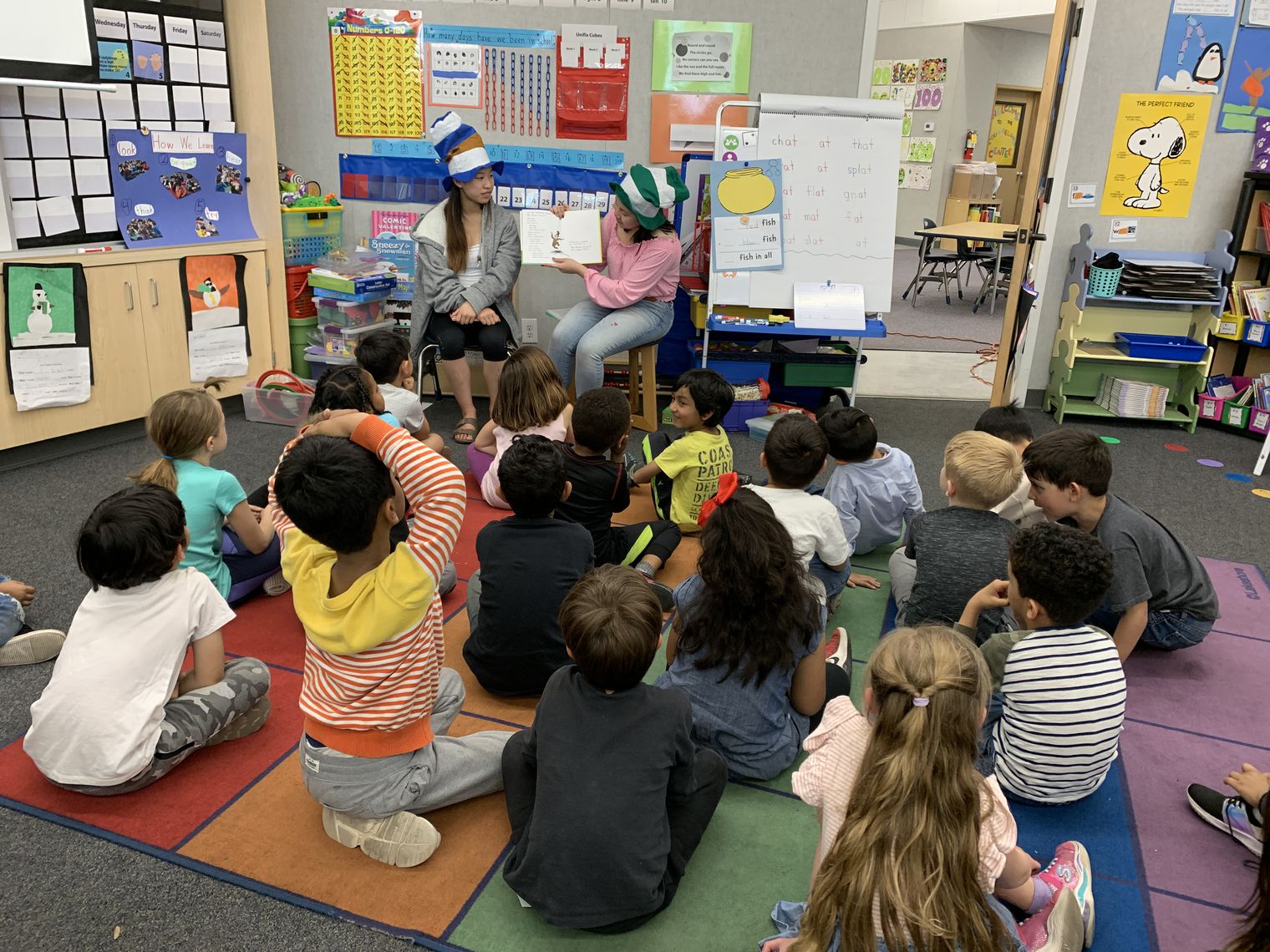 Two students reading to a class