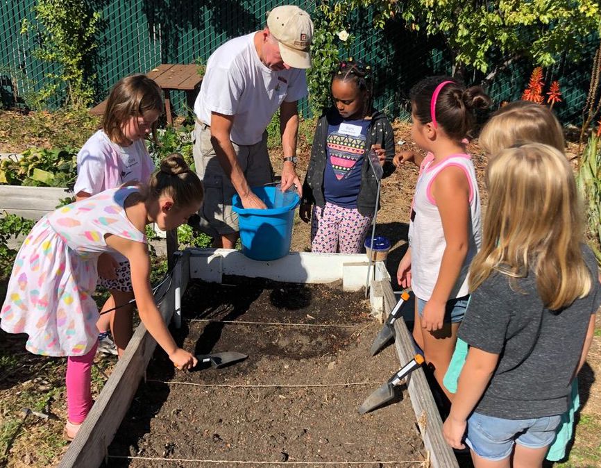 Students around a planter box