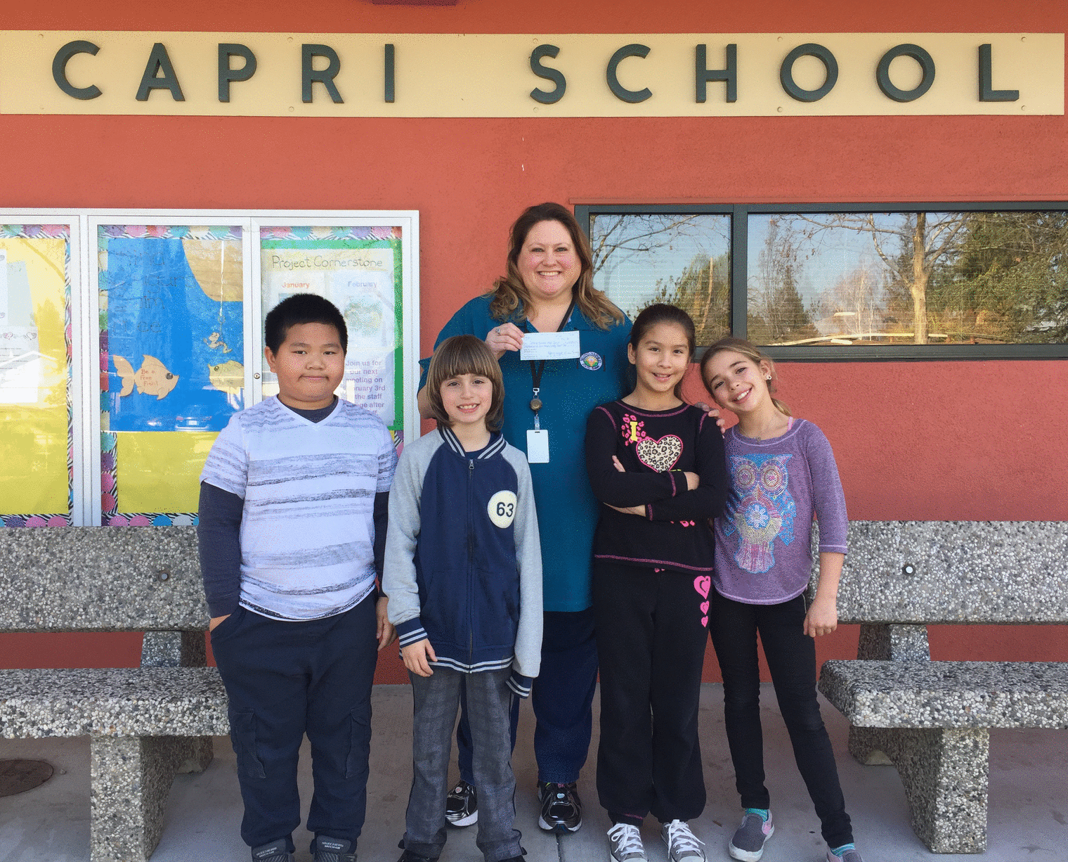 students present donation check