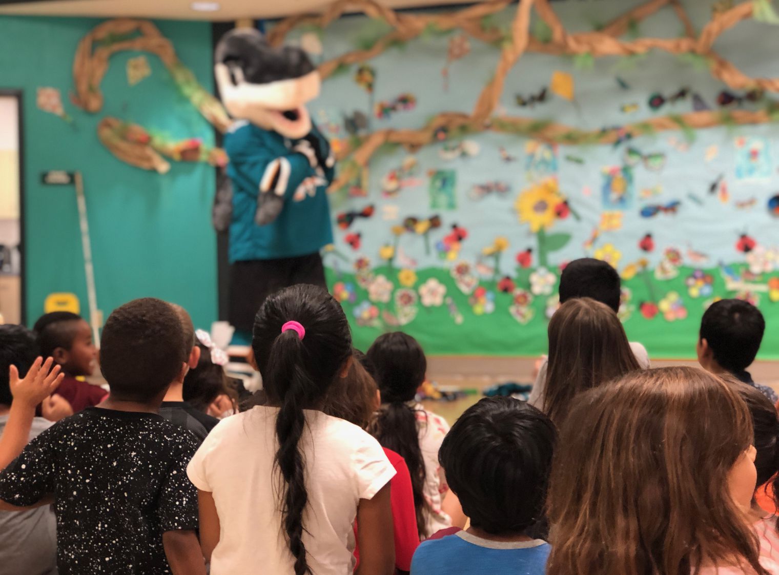 Sharkie in front of students
