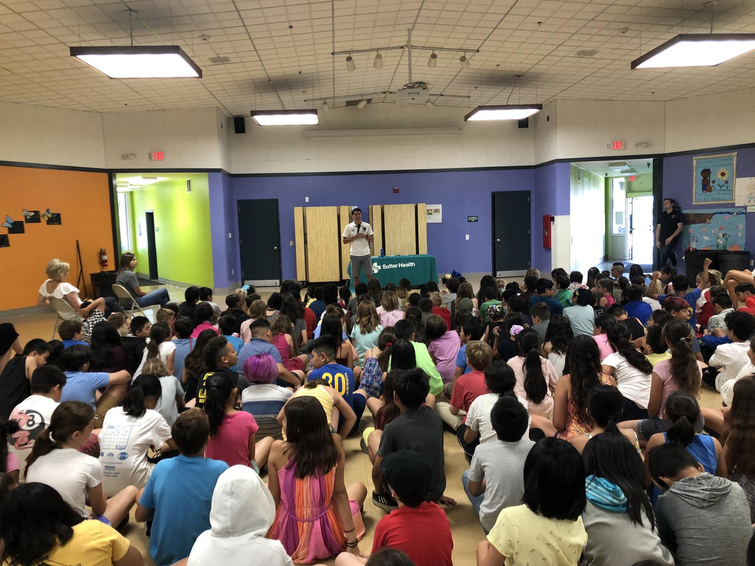 Group of students at an assembly